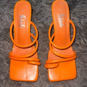 Never worn before orange square toe heels, size 8